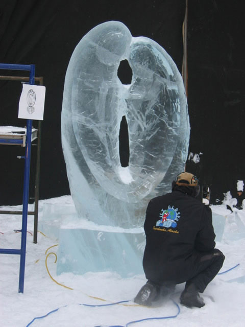 Ice carving “Love,” Qifeng at work.